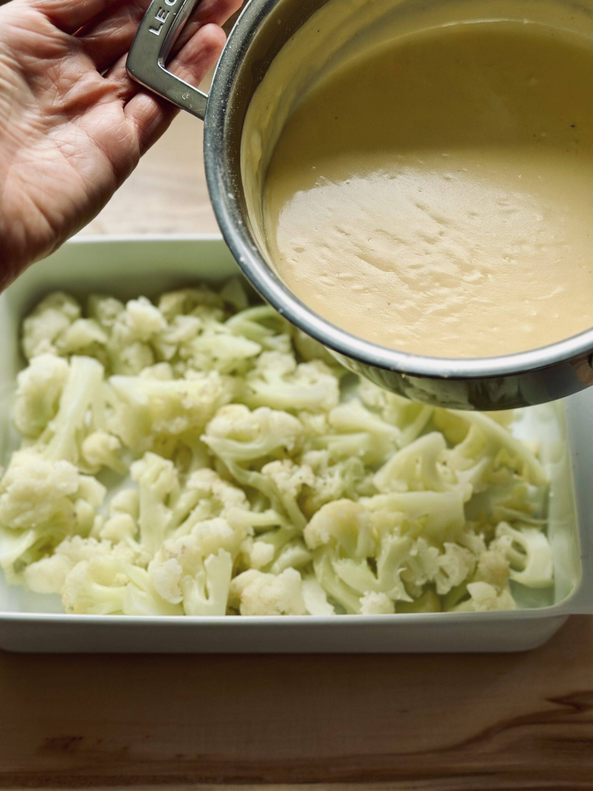 Käse über den Blumenkohl Giesen