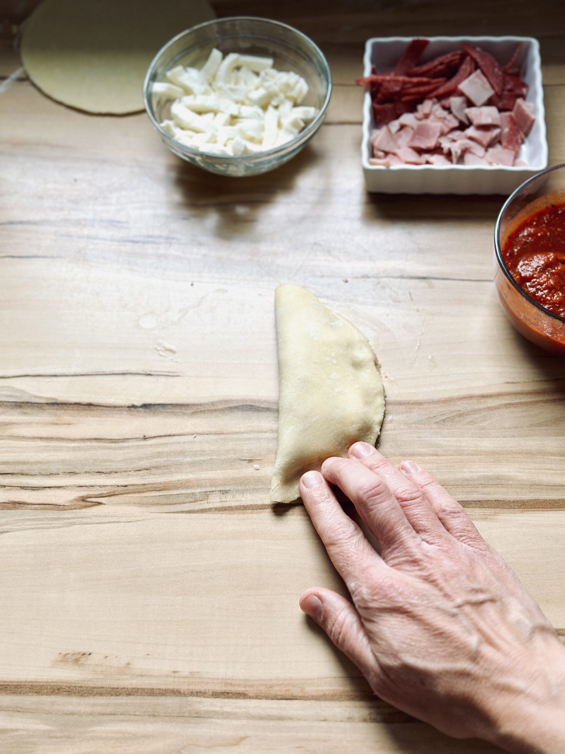 Teigling zuklappen und festdrücken