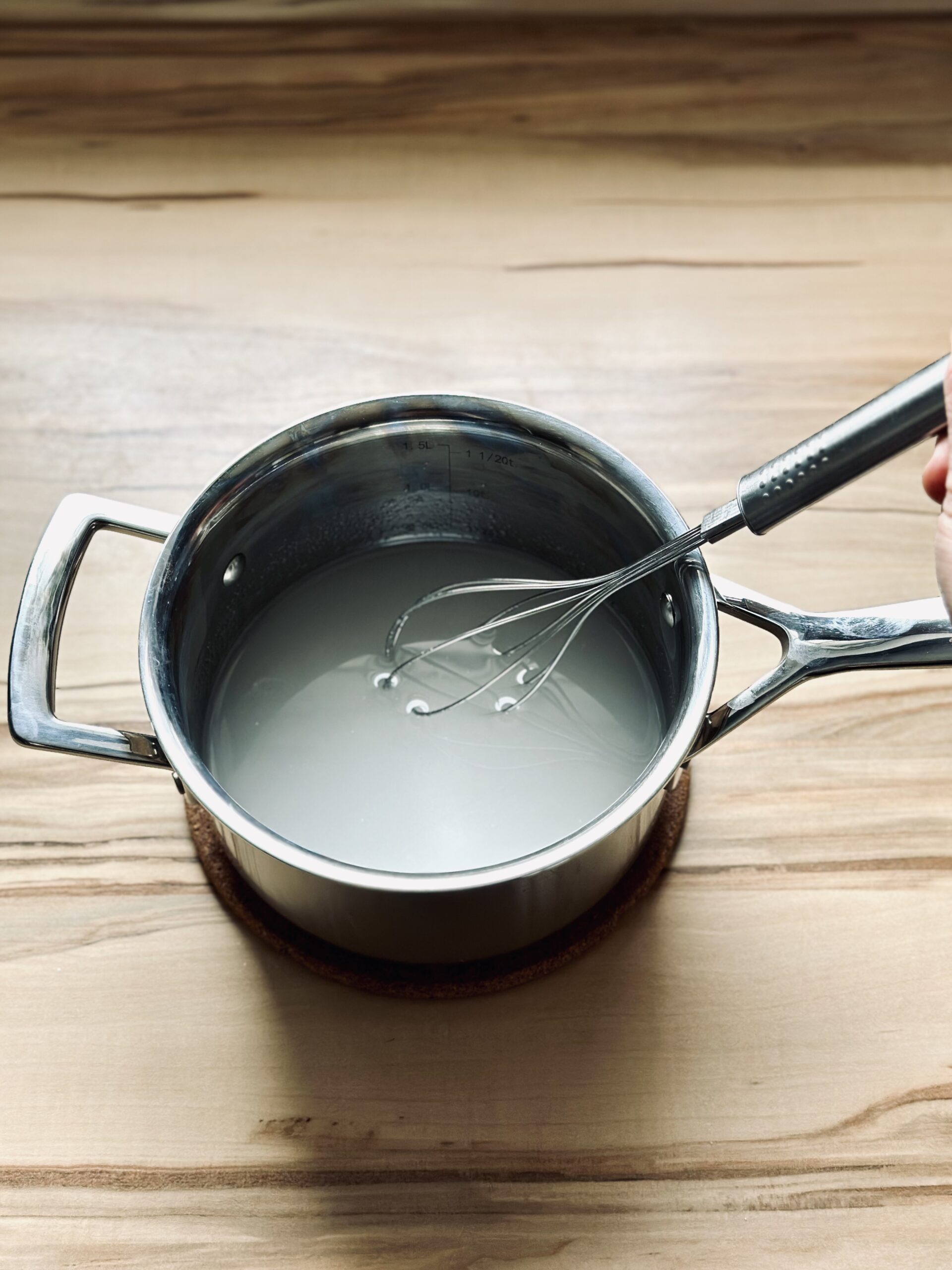 Zuckermischung gut verrühren und zum kochen bringen