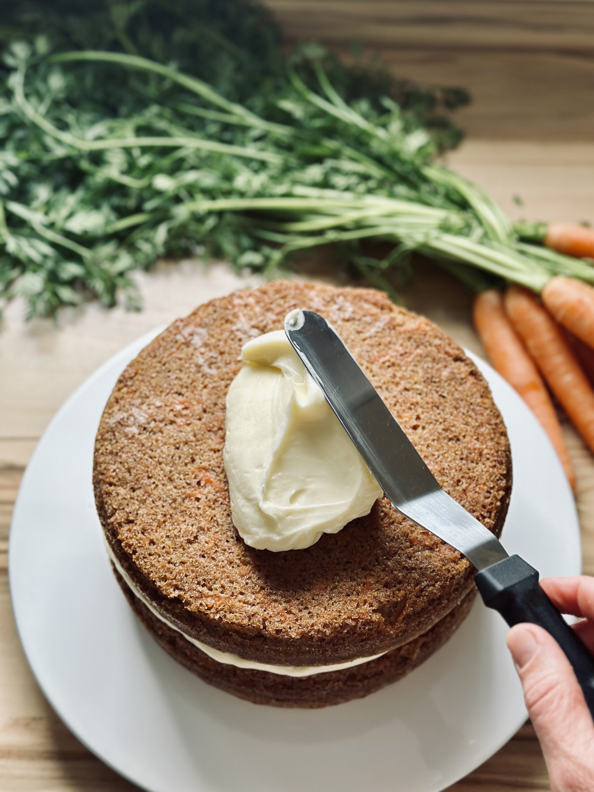 Creme ebenfalls auf dem Kuchen verteilen 